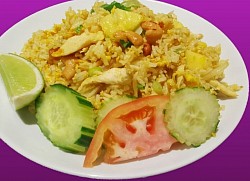 Pineapple Fried Rice- Stir fry rice with choice of meat, cashew nut, onions, pineapples, raisins and eggs- $14.95